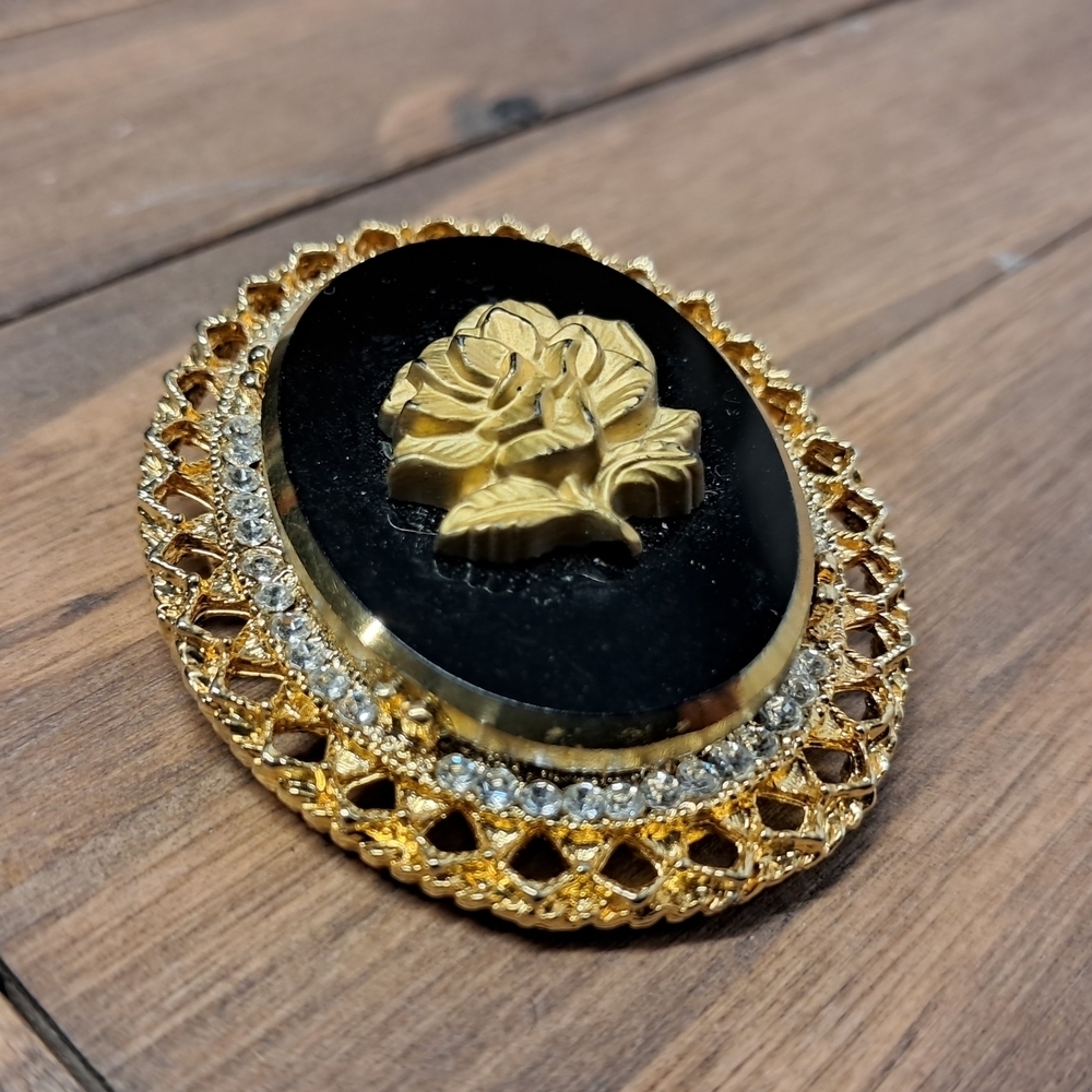 Vintage Celebrity NY Gold and Black Floral Brooch